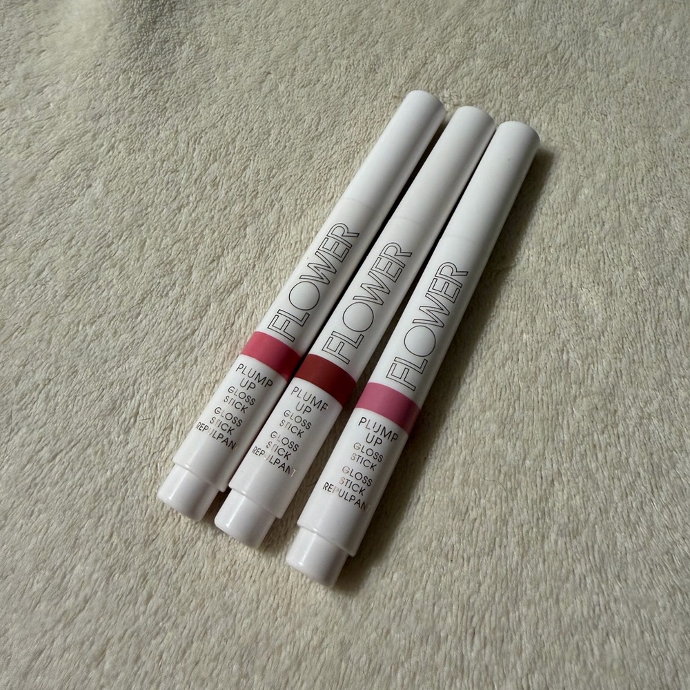 Flower Beauty Plump Up Gloss Stick in Spicy Sizzle and Toasty
